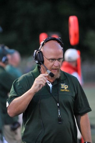 Coach Brian Lee has guided KP's football team to a 25-game winning streak and two consecutive Super Bowl championships.  (Photo by Scott May)​