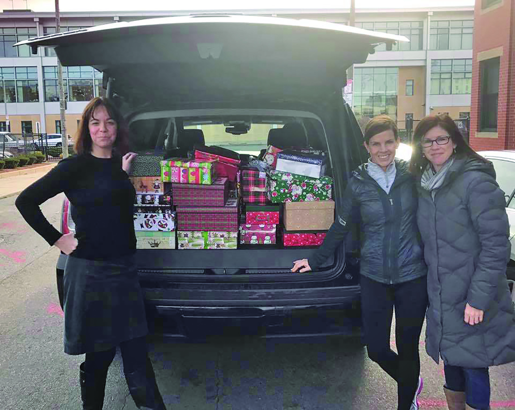 (l to r) Katie Amoro of Rosie’s Place, with Norfolk residents Maura Birenbaum and Joan Marsden last December.