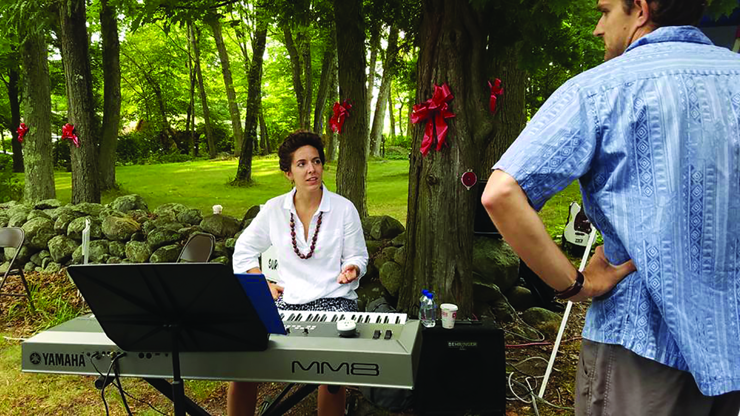 Victoria Mariconti on the keyboard at Cherry Street in a previous Pan Mass Challenge, with KP percussion instructor Ryan Loud.