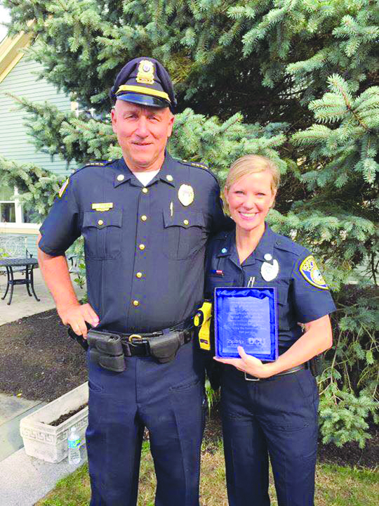 School Resource Officer Michelle Palladini with Norfolk Police Chief Chuck Stone.