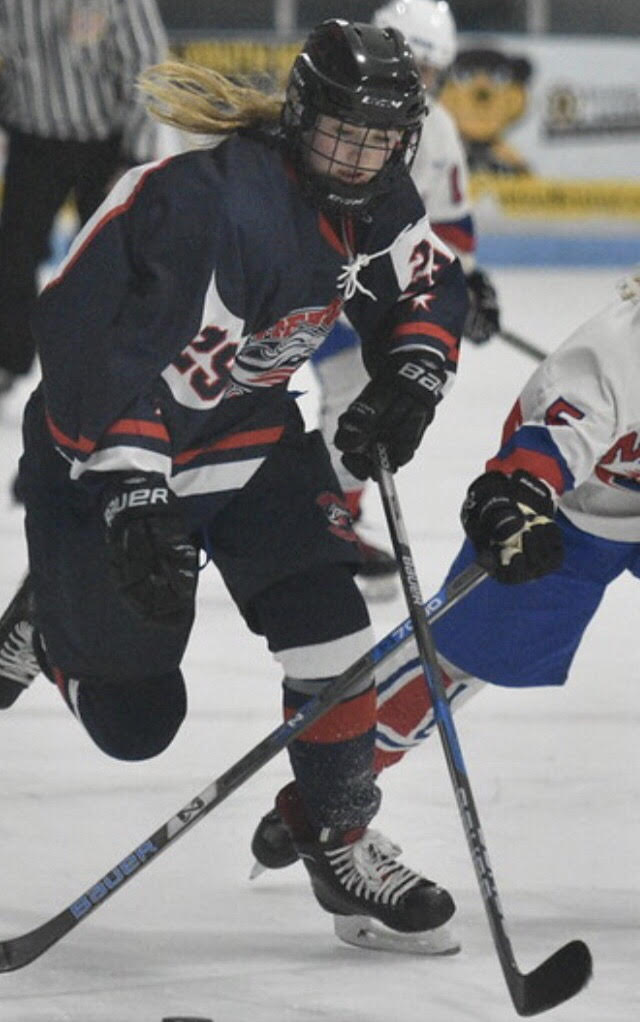 Millis students Emma Rice and Marina Yasuna have found the Medway-Ashland girls’ hockey team to be a welcoming group, despite the challenge of traveling to practice in Marlboro. 