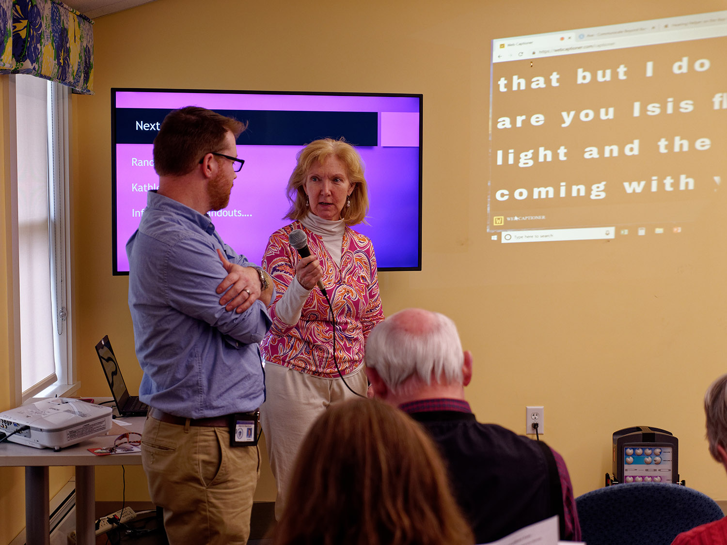 The Franklin Senior Center has launched a new hearing center aimed at providing resources and referrals for people aged 50 and older experiencing hearing loss. Shown, Franklin Senior Center’s Maggie Gunderson, right, asks a question of Chris Plant, a field service advisor with the Massachusetts Equipment Distribution Program.