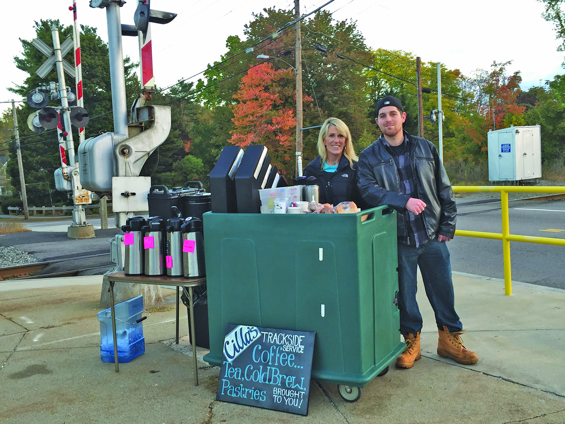 Ready for commuters: Mary Ellen Blue and son Mike Bershad staff the kiosk.