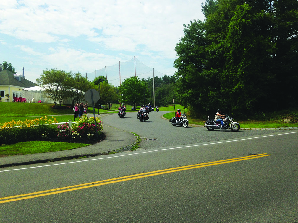 Bikes pulled out of Pinecrest Golf Course in an orderly fashion on the hot morning of July 22nd, for the 7th Annual Action for Jackson fundraiser for Boston Children’s Hospital Down Syndrome unit.