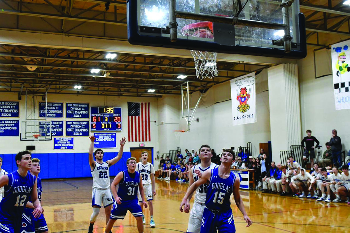 Dan Liberatore connects on a free throw for his 1,000th point.