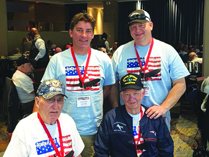 Franklin firefighter Steve Lewis was so impressed with his father,  Al’s experience with Honor Flight that he hopes to persuade local groups to support the effort. Back, Left to Right, Steve Lewis,  Patrick Weidman, front, left to right Al Lewis, Bob Weidman,  all Franklin residents, contributed photo